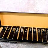Set of 11 blackened resin knife holders, 1970s