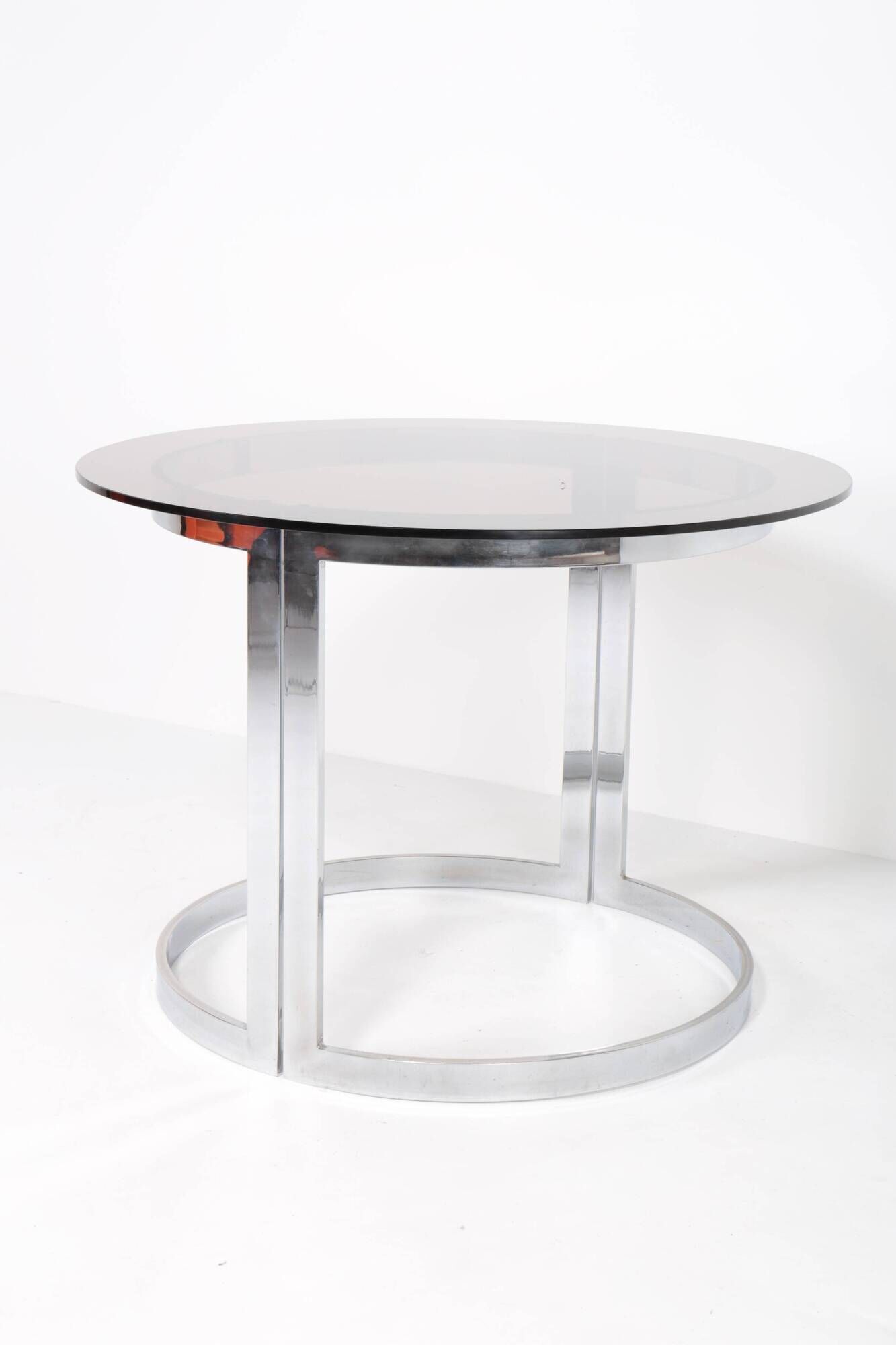 Vintage round table in chrome steel and smoked glass, 1970s