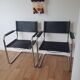 Pair of armchairs in chrome and black leather