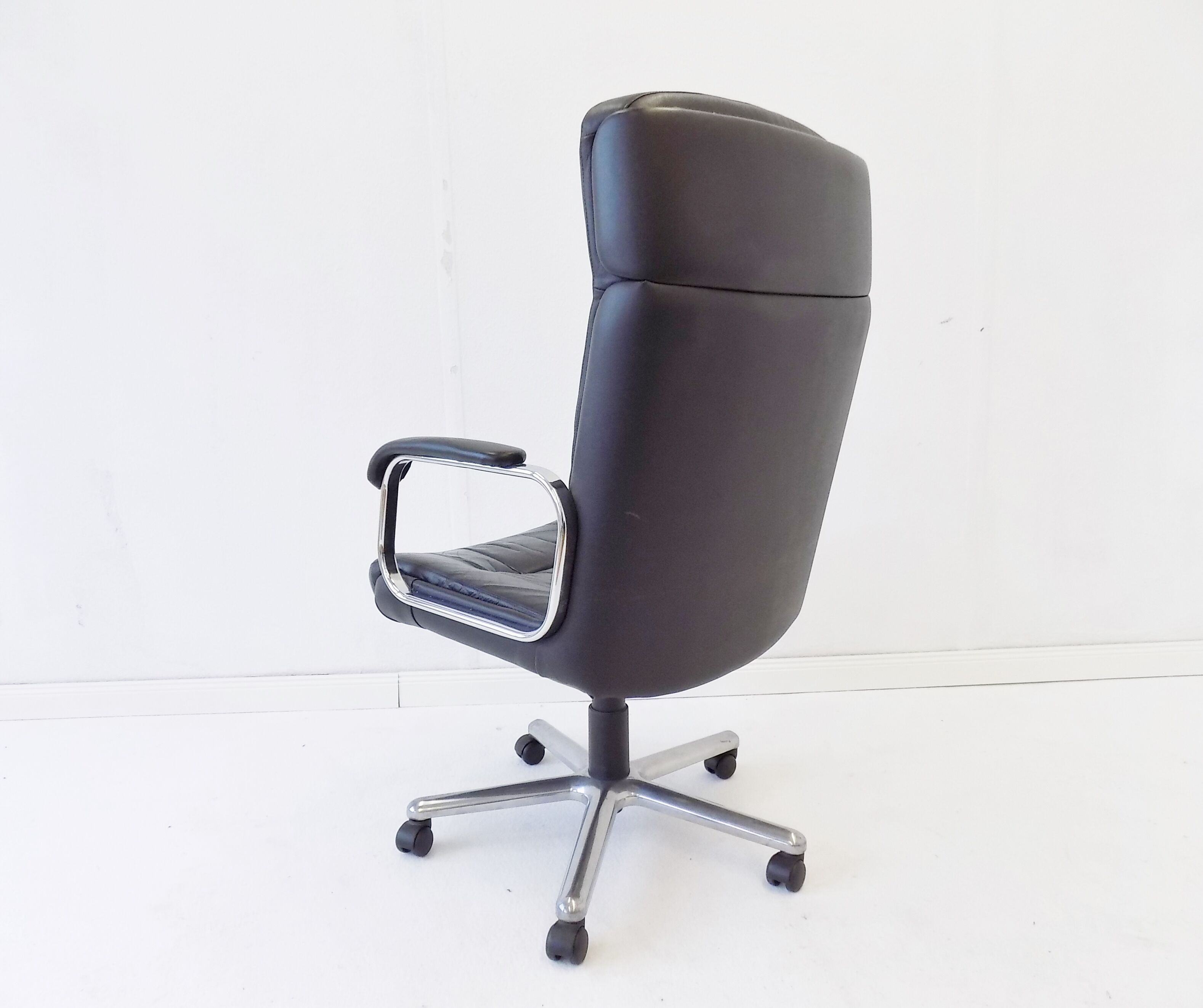 German office armchair black leather 70s