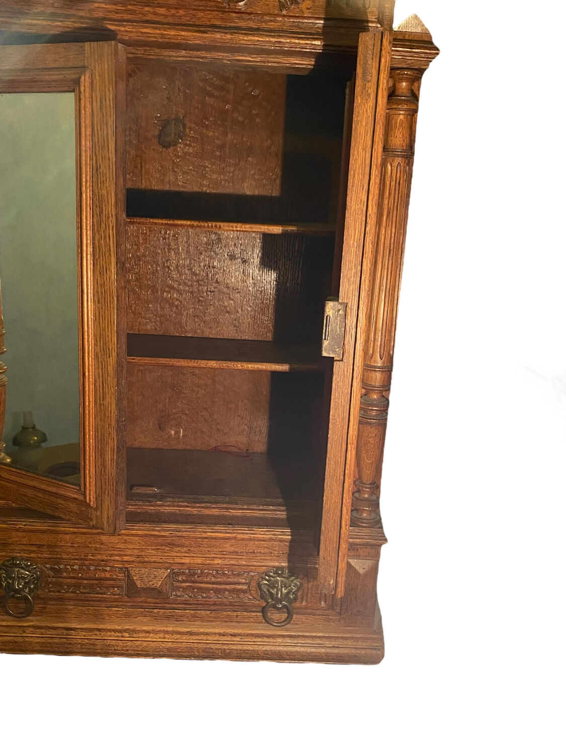 Lion's head oak shelf cabinet