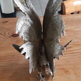 2 silver metal roosters
