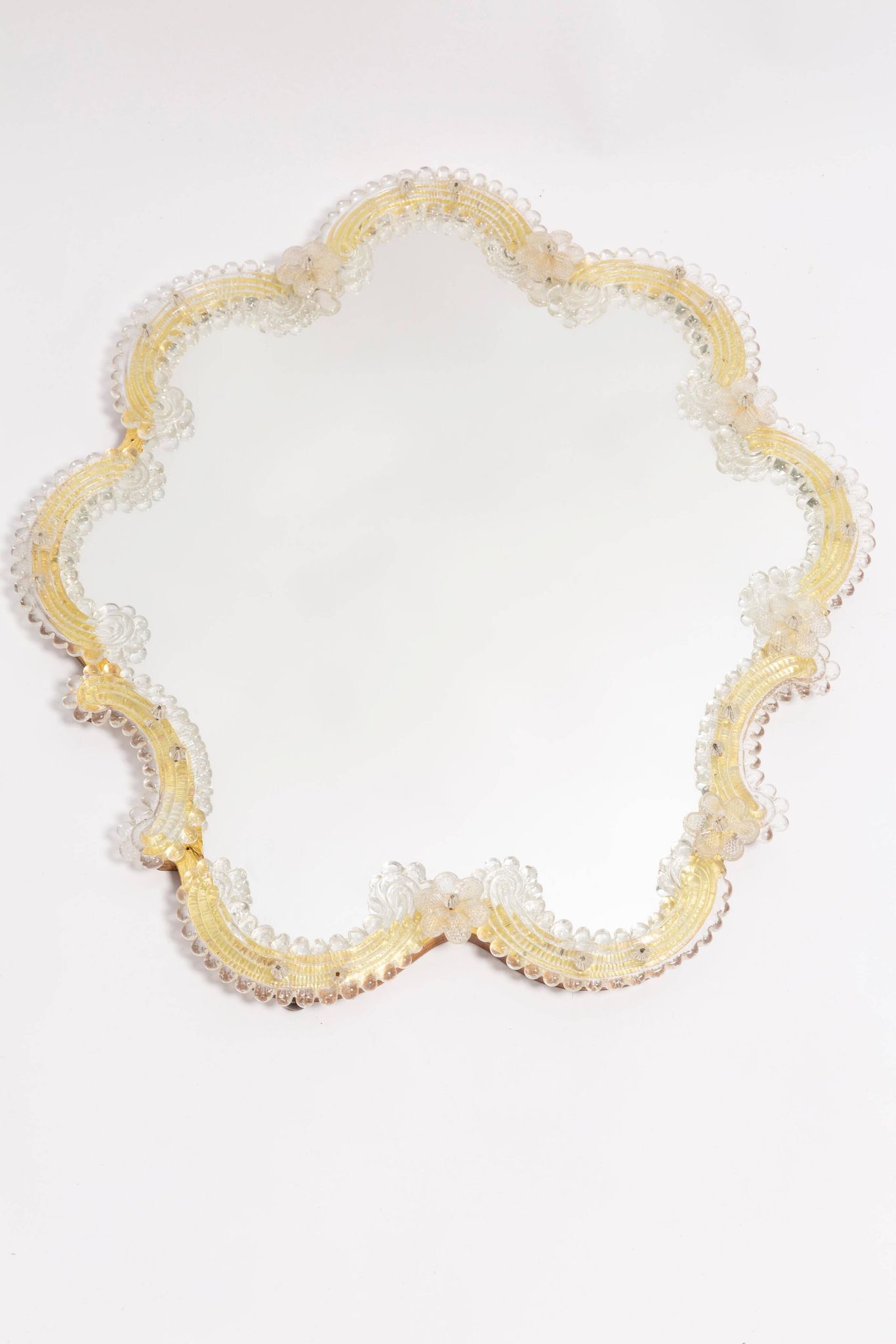 Mid-century decorative mirror in a floral frame, Italy, 1960s.