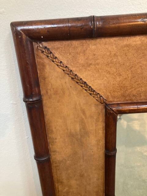 Big faux bamboo and leather mirror
