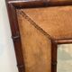 Big faux bamboo and leather mirror