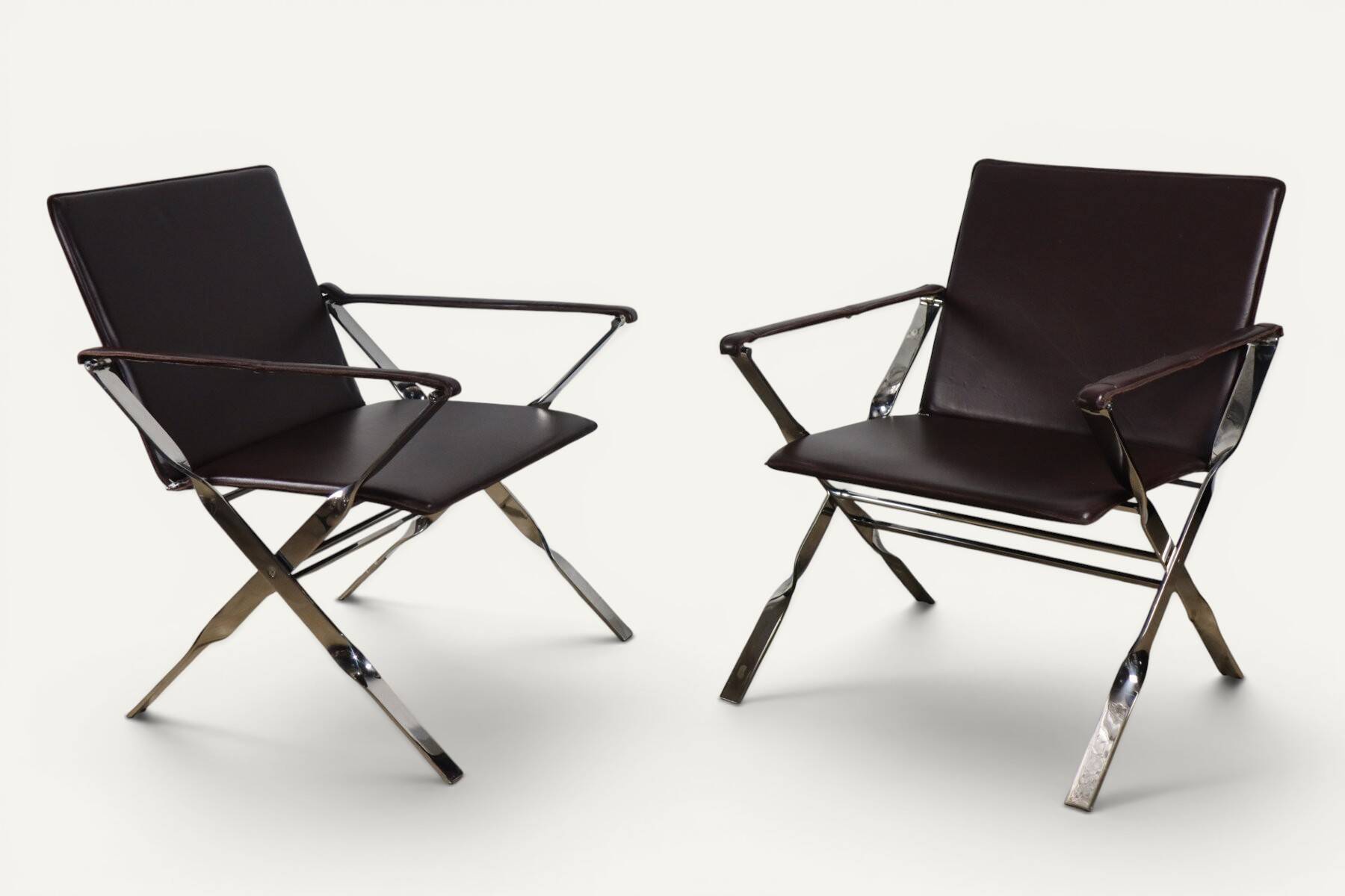 Pair of leather and chrome metal armchairs, Italy - 1970