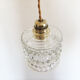 Suspension made with a vintage glass globe