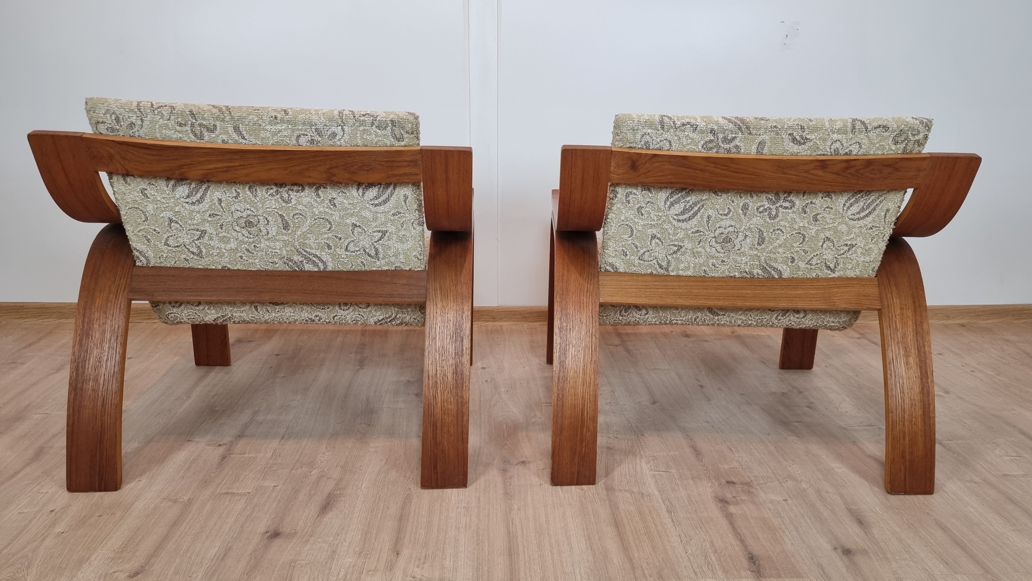 Pair of armchairs by Drevopodnik Holesov