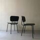 2 airborne chairs in black wired metal and black vegetable leather, design 1970