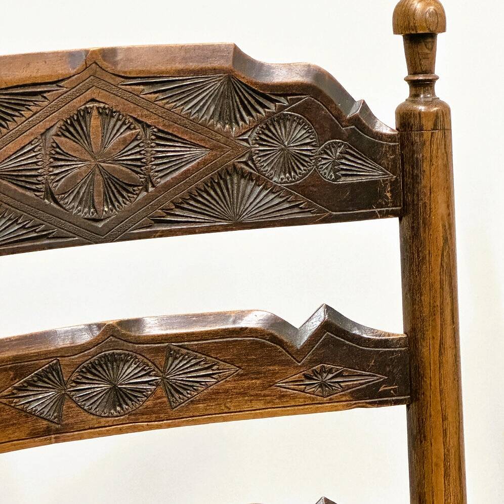 19th century handcrafted and carved ladder back chair, circa 1840s.