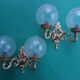 Pair of large double-light wall sconces in vintage brass and glass