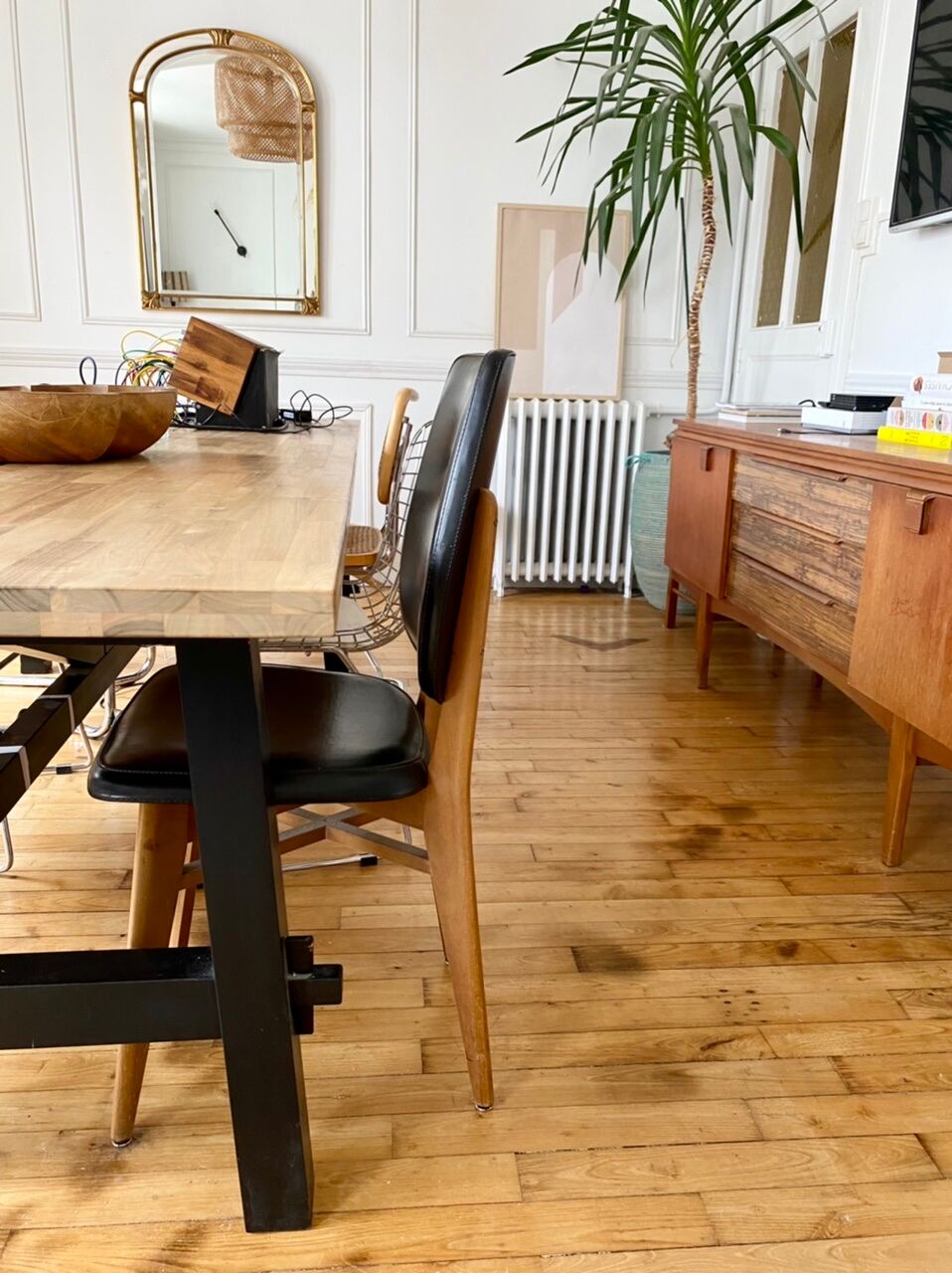 Pair of vintage wood and leather chairs