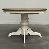 Round extendable oak dining table