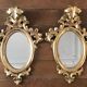 Paire de miroirs rococo dorés en bois sculpté