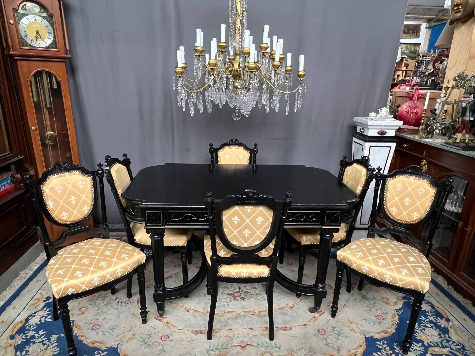Dining room set consisting of a table and six chairs from the Napoleon III period.