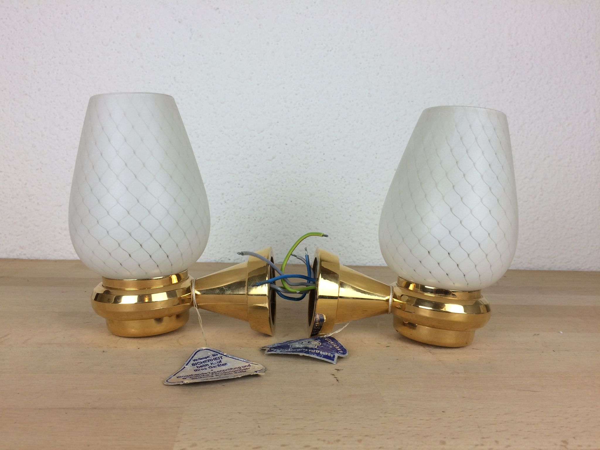 Pair of solid brass and white opaline wall lamps