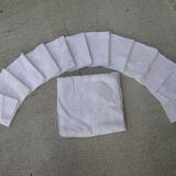 Tablecloth and its twelve monogrammed towels.
