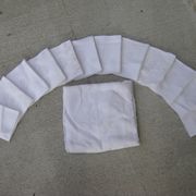 Tablecloth and its twelve monogrammed towels.