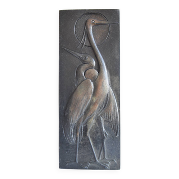 Relief du milieu du siècle avec des hérons