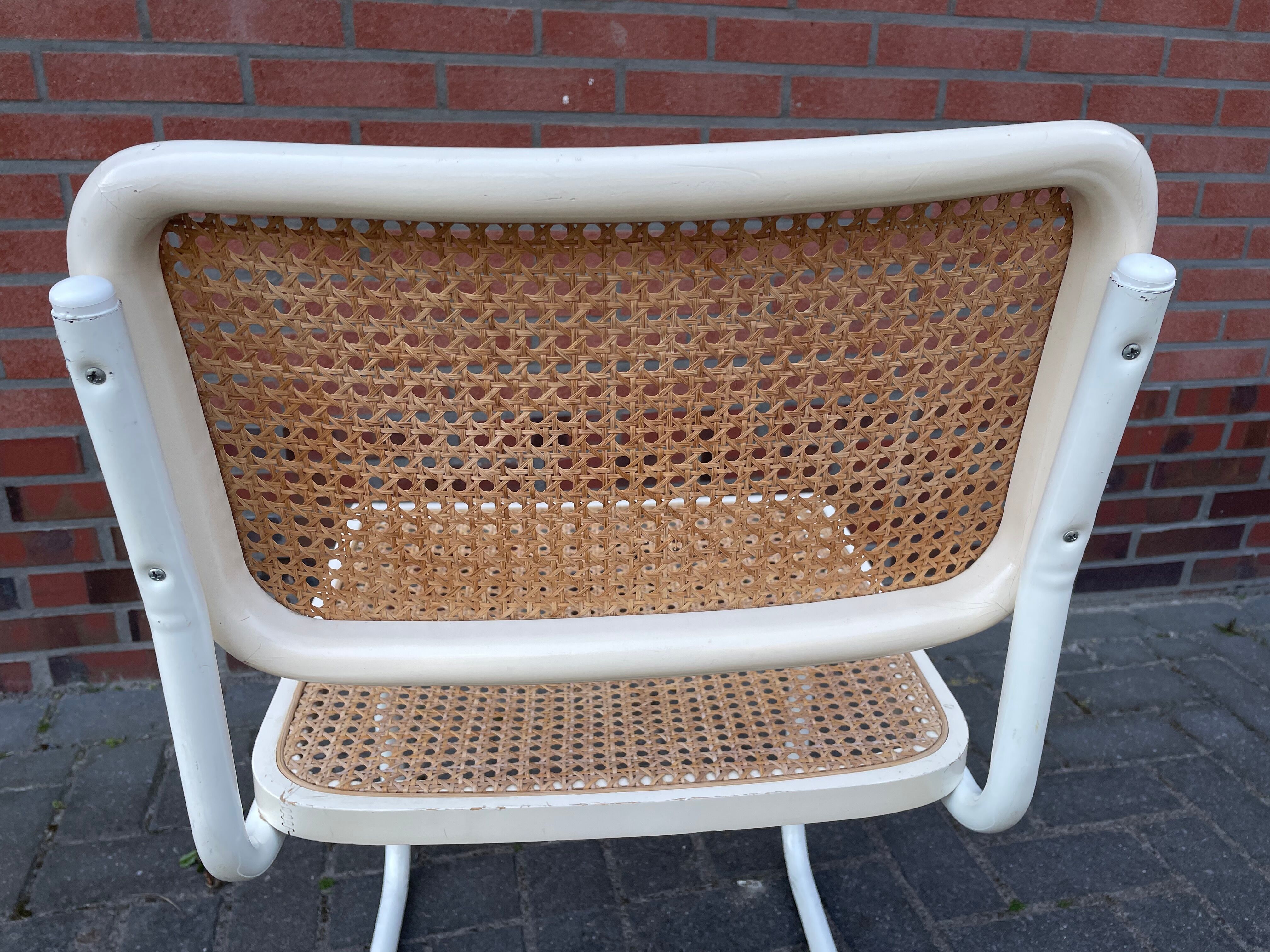Cesca dining room chair designed by Marcel Breuer