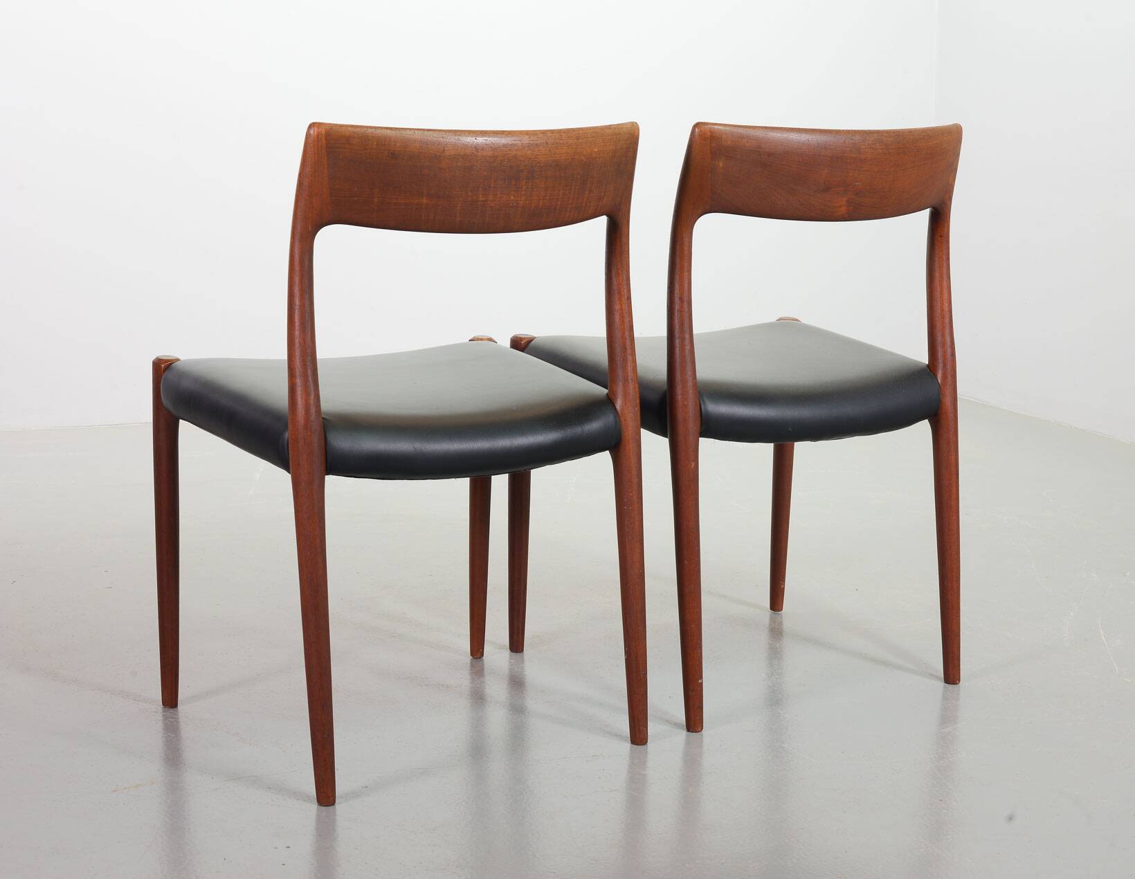 Niels Otto Moller Teak Wooden with Black Leather Dining Chairs, Model 77