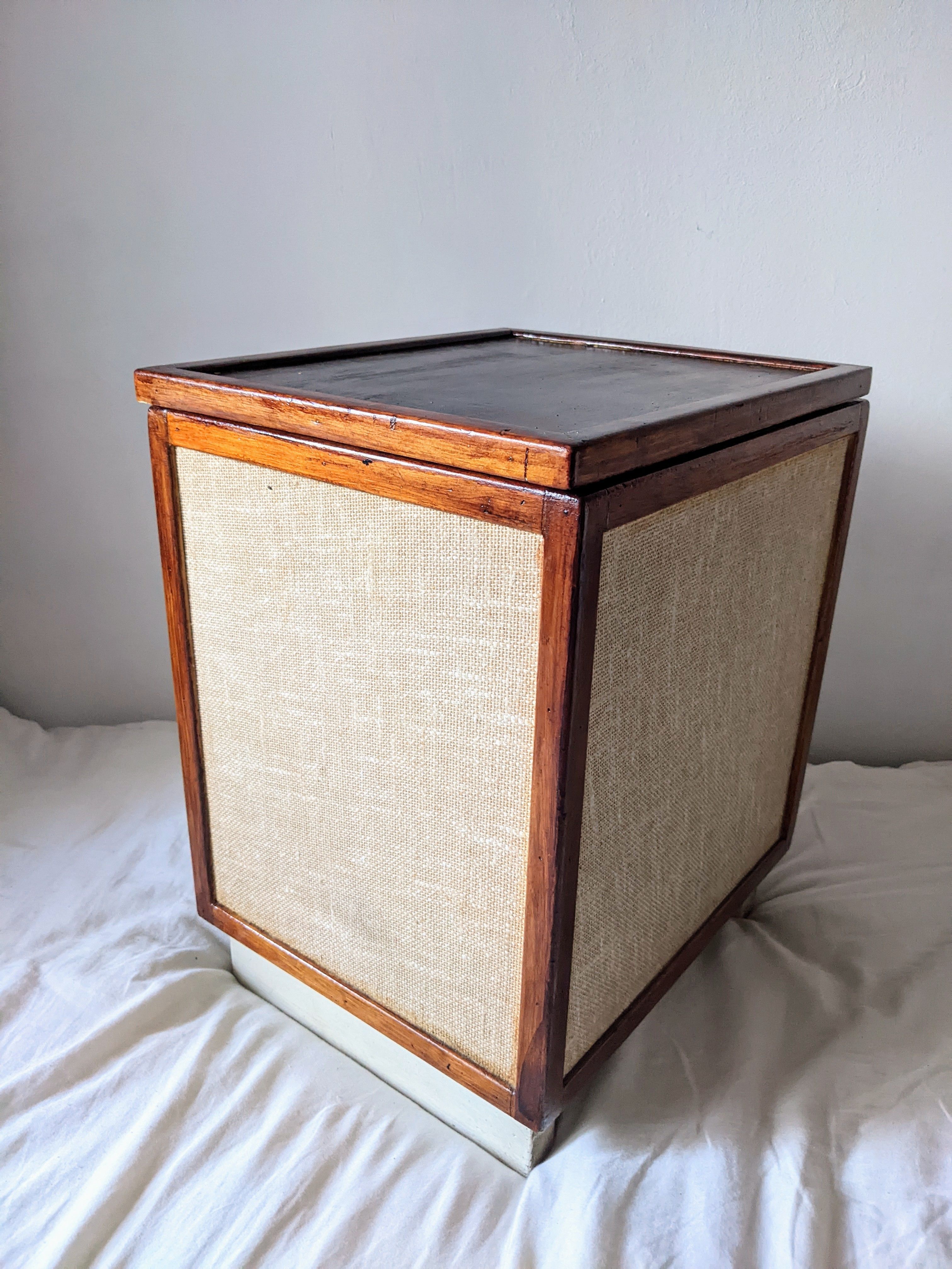 Burlap chest and varnished wood