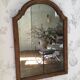 Antique tall round mirror
