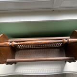 Wooden and cane newspaper rack