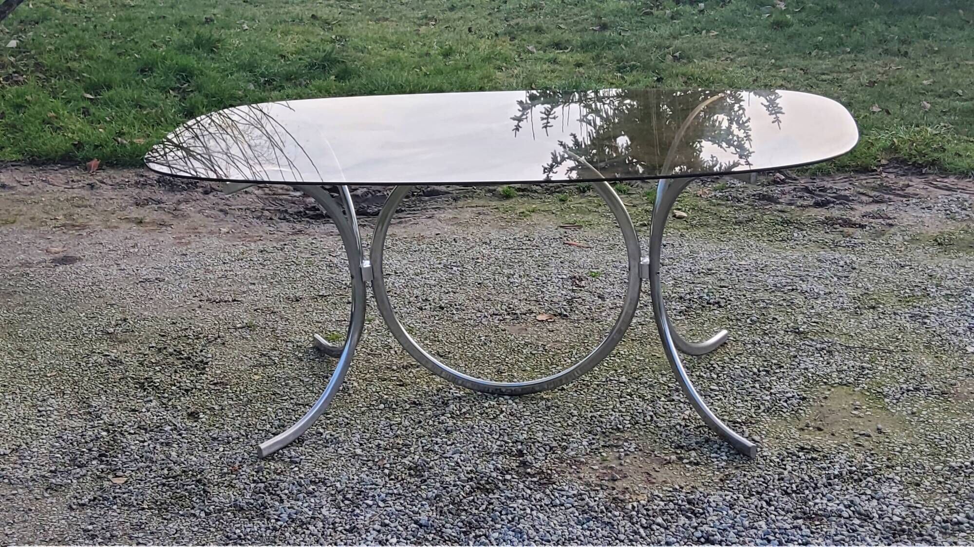 Designer table from the 70s, smoked glass top, chrome base