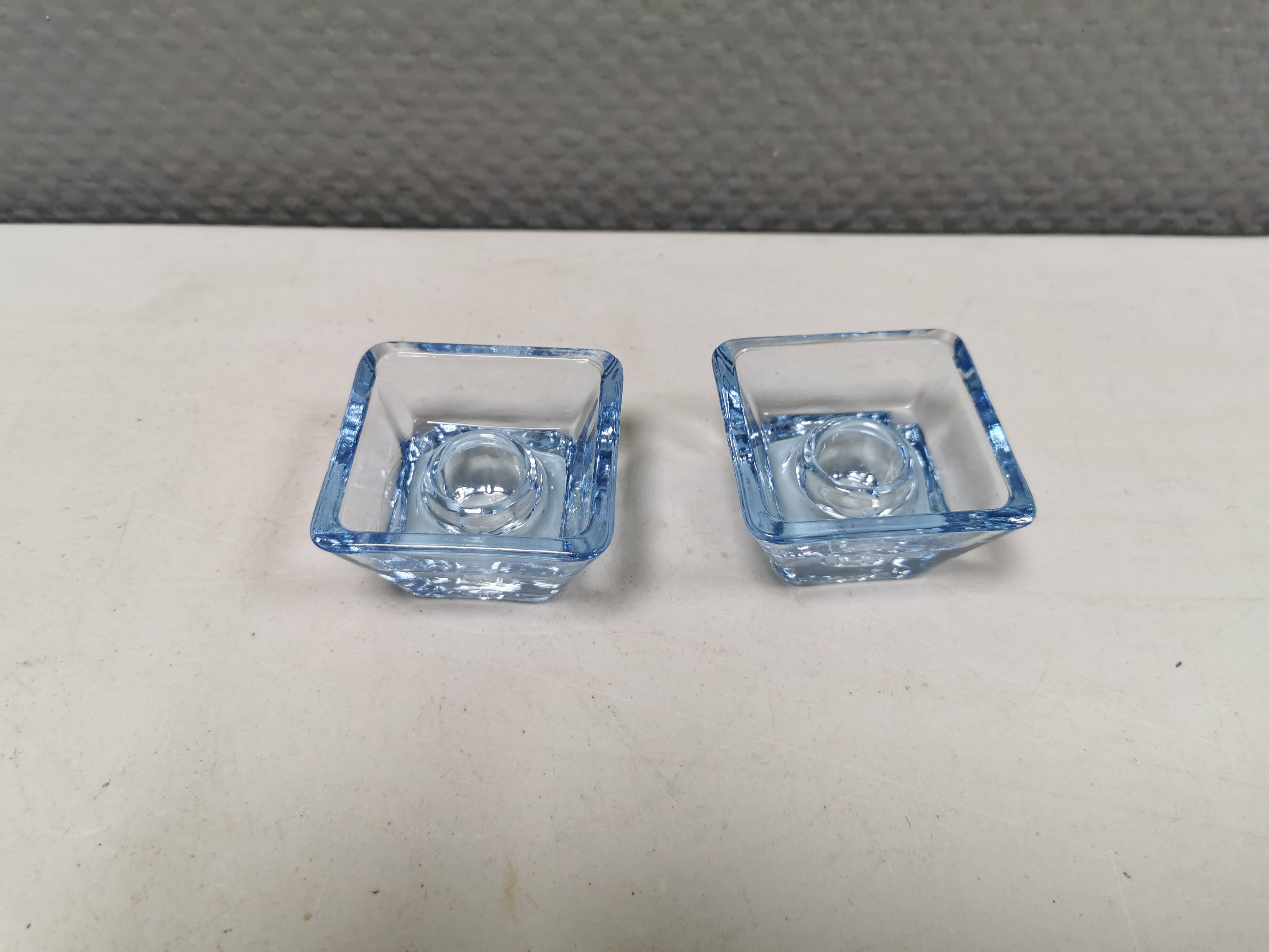 Two candleholders in turquoise/tranparent glass from Danish Kastrup-Holmegaard glassworks 1965-72