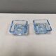Two candleholders in turquoise/tranparent glass from Danish Kastrup-Holmegaard glassworks 1965-72