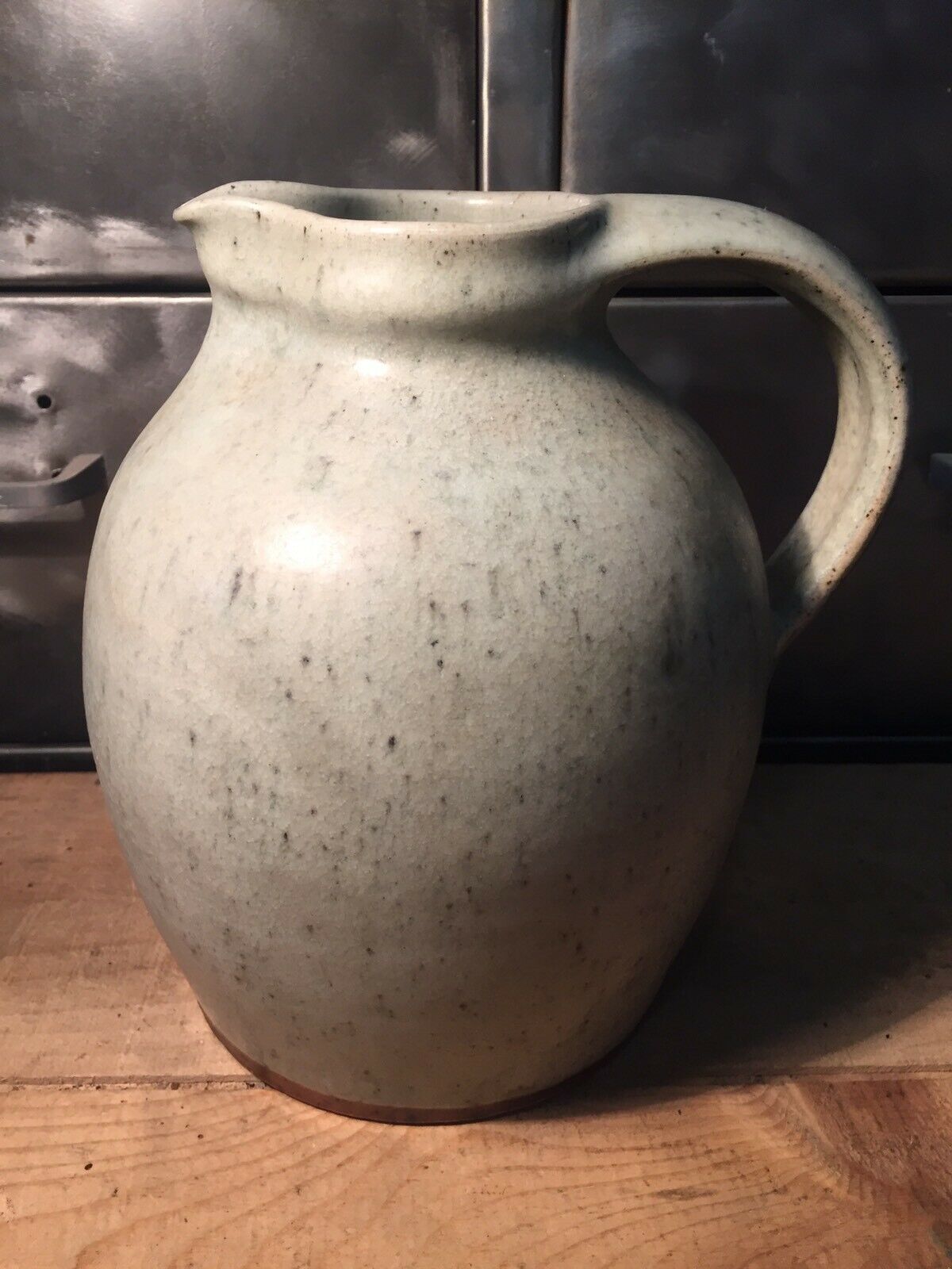 Pitcher in speckled gray enamelled sandstone signed