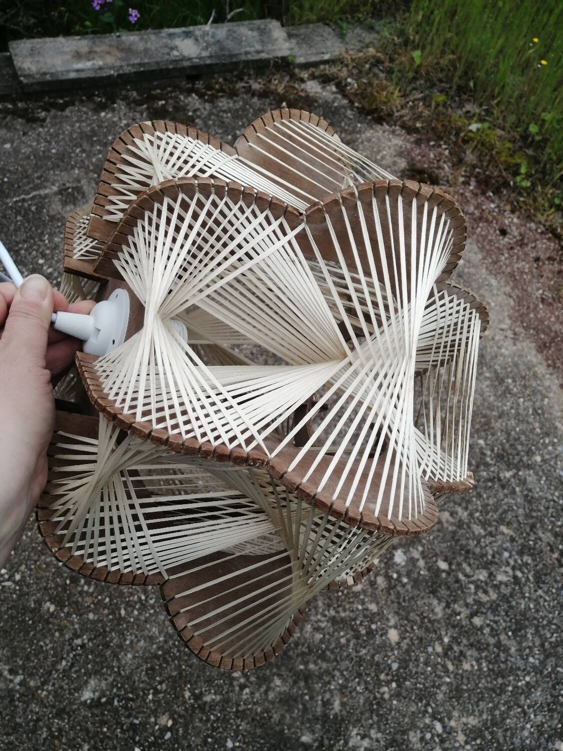 Pair of vintage wooden and rattan straw pendant lights.