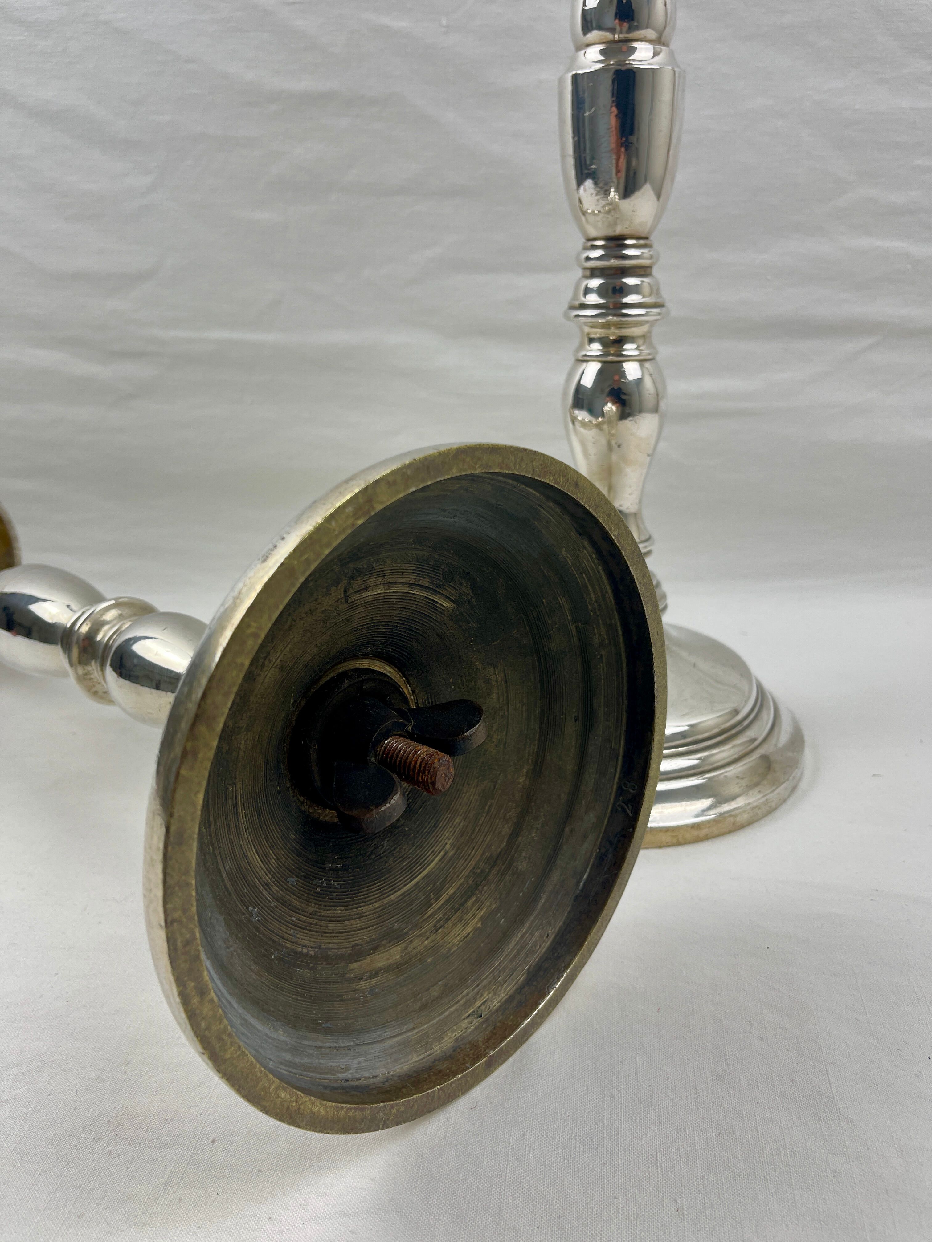 Pair of candle picnickers in silvered bronze