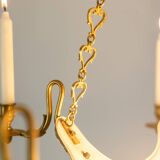 Maison Baguès. Lustre de style Empire en bronze doré. Années 1950.