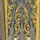 Rectangular Indonesian construction element with blue and yellow plant in carved wood
