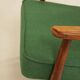 Scandinavian modern chair in green wool, vintage wooden armchair.