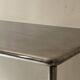 Dining table / tubular and modernist desk in chrome metal