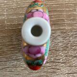 Small bottle for tobacco