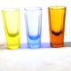 Set of 5 Art Deco 1920s shooter glasses in coloured and uranium glass - ouraline.