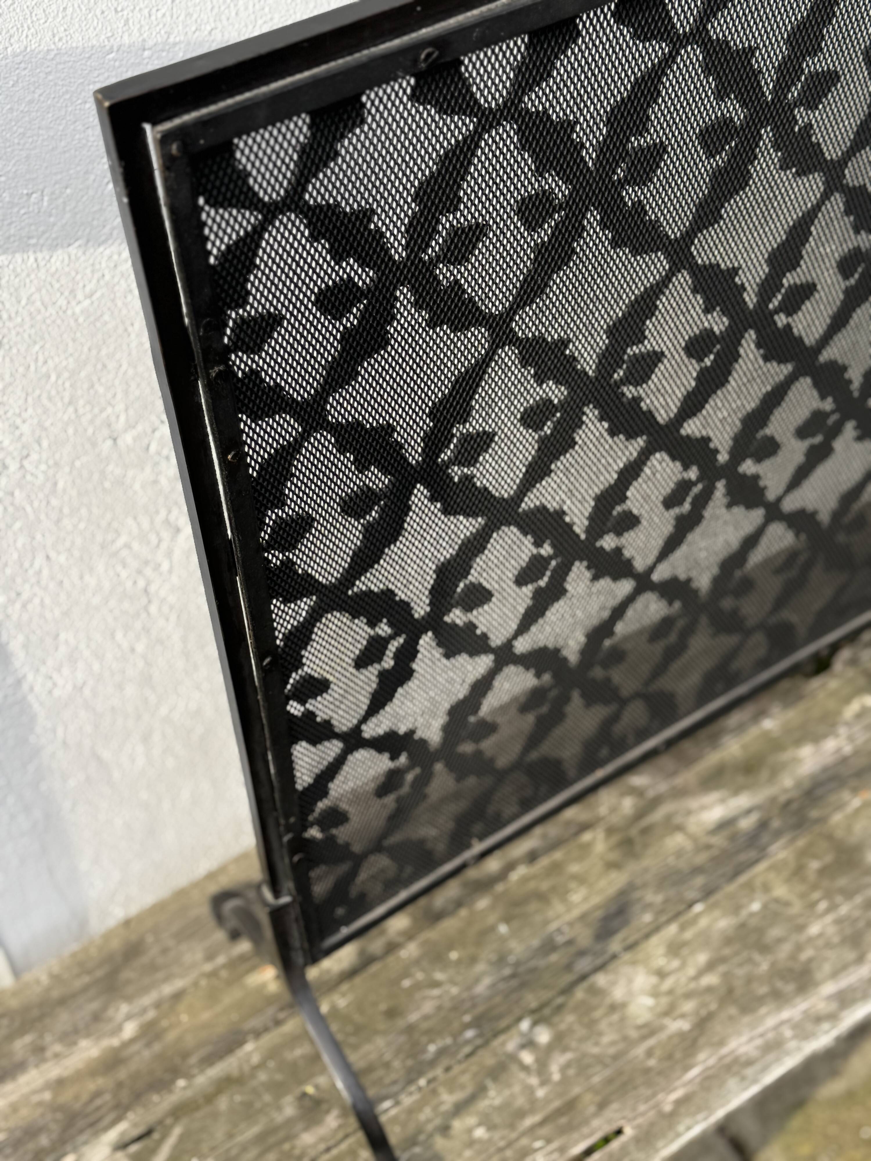 Wrought iron fire screen, France