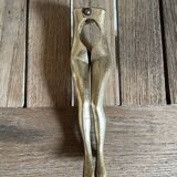 Walnut breaker in the shape of women's legs golden brass vintage
