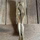 Walnut breaker in the shape of women's legs golden brass vintage