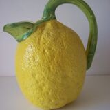 Vintage pitcher has form of lemon
