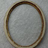 Old oval shaped wooden frame