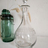 Old wine carafe in glass worked