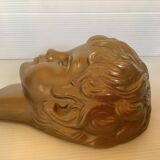 Golden cherub head