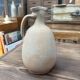 Unfired clay pitcher