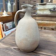 Unfired clay pitcher