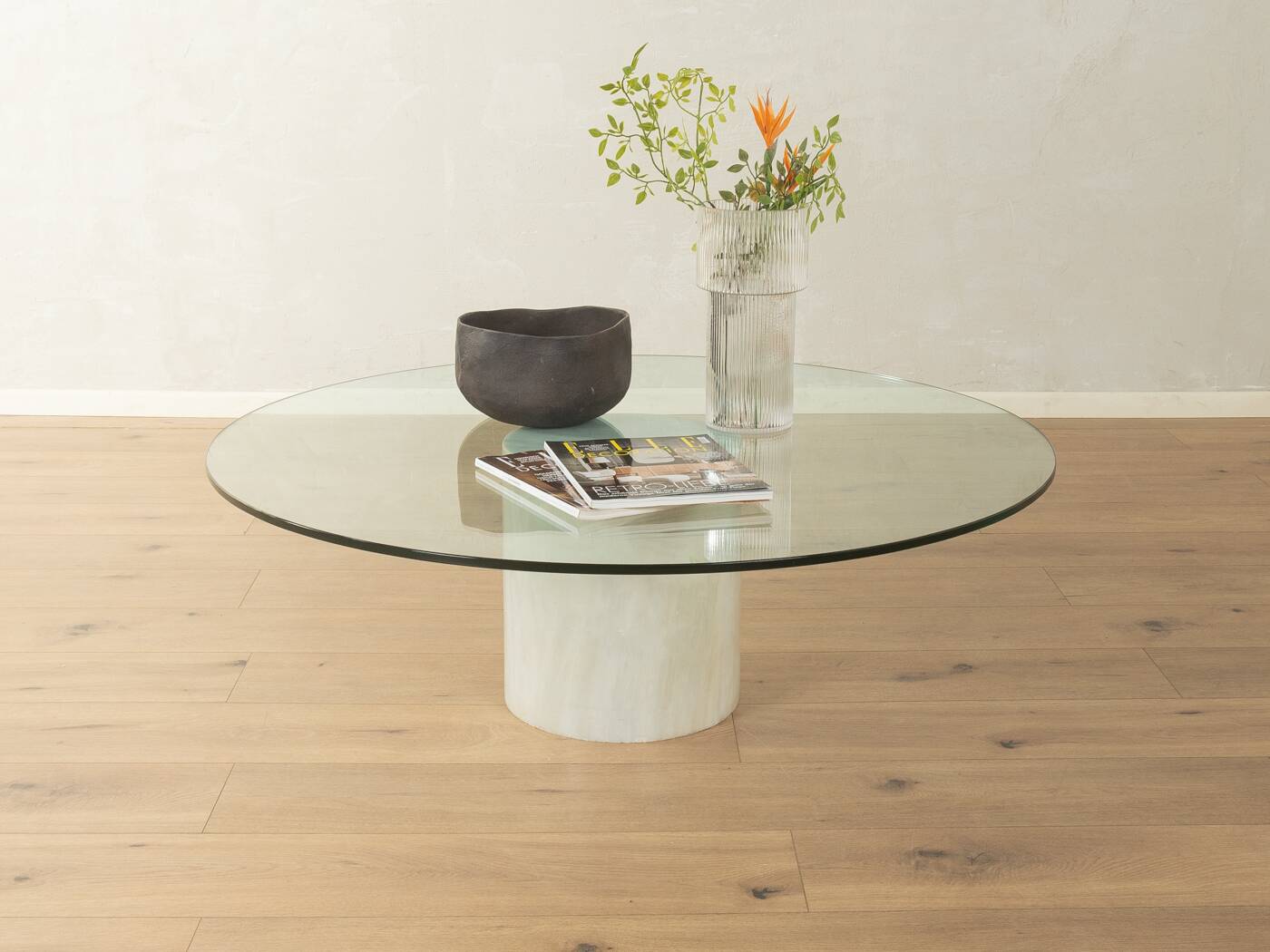 Postmodern coffee table from the 1980s with marble base and glass top